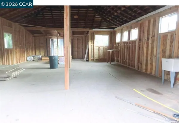 a view of a room with a large window