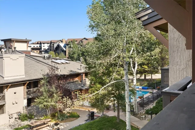 a view of balcony with wooden floor