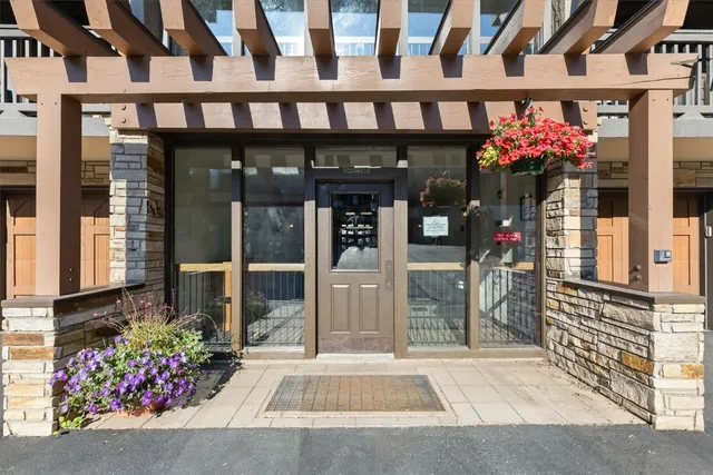a view of a cafe with sitting area