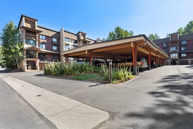 an aerial view of residential houses and city street