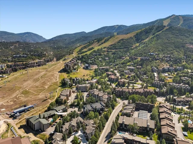 an aerial view of residential house with parking space