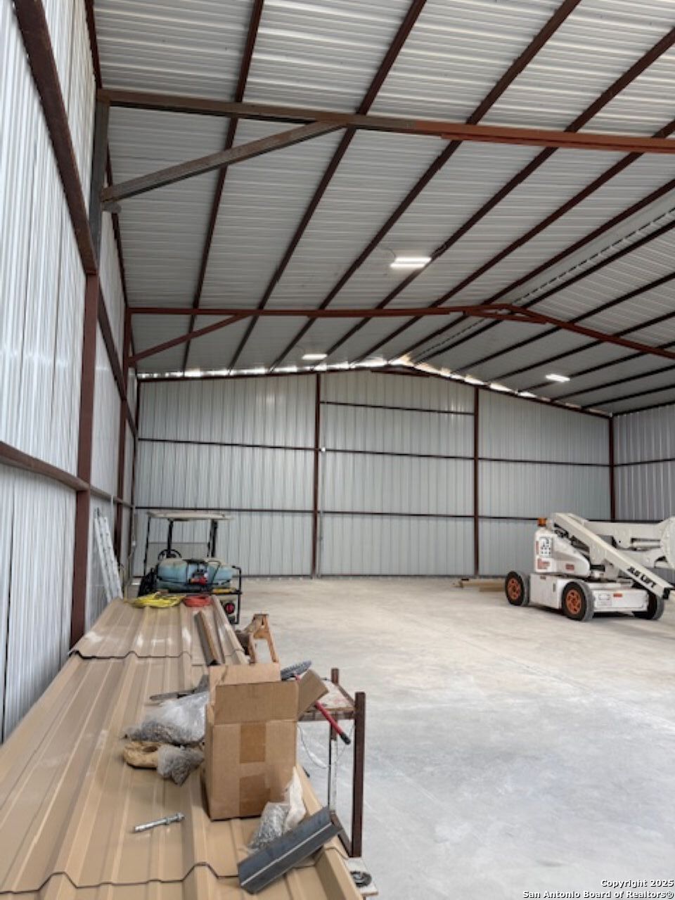 2100 South Fm 187 Sabinal, TX 78881 - Photo 5 of 6 a view of parking garage with cars