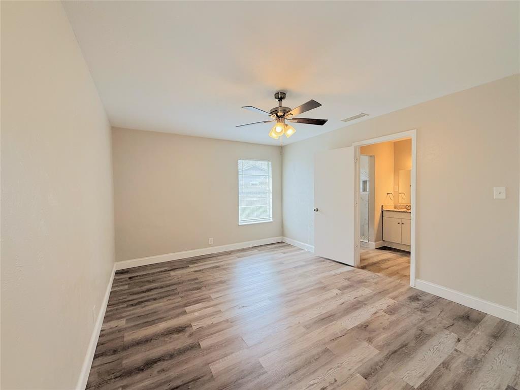 4075 Old Bonham Road Paris, TX 75460 - Photo 15 of 20 a view of an empty room with a window