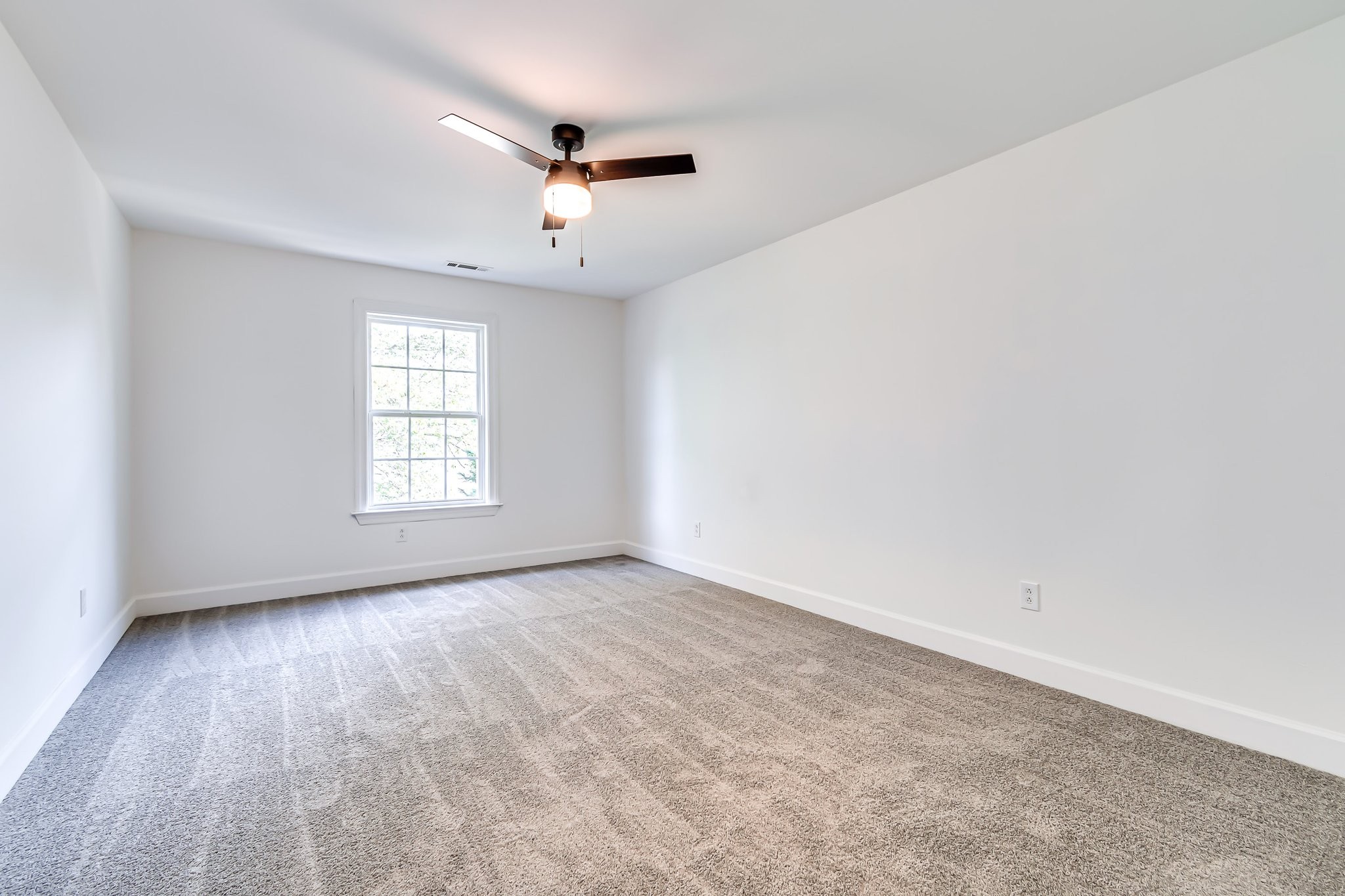 5126 Reagan Drive Murfreesboro, TN 37129 - Photo 13 of 20 an empty room with windows and ceiling fan