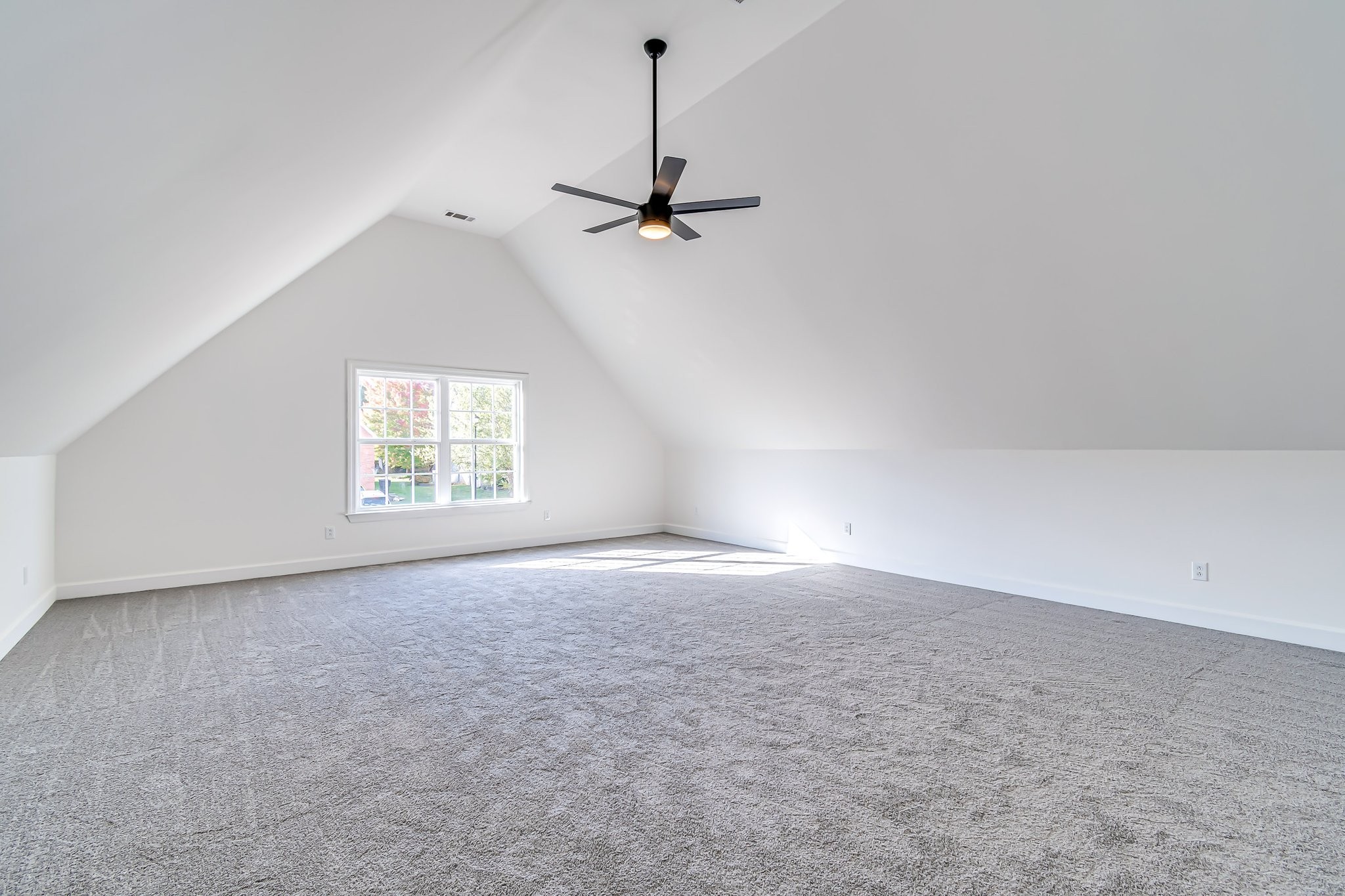 5126 Reagan Drive Murfreesboro, TN 37129 - Photo 16 of 20 an empty room with windows and ceiling fan