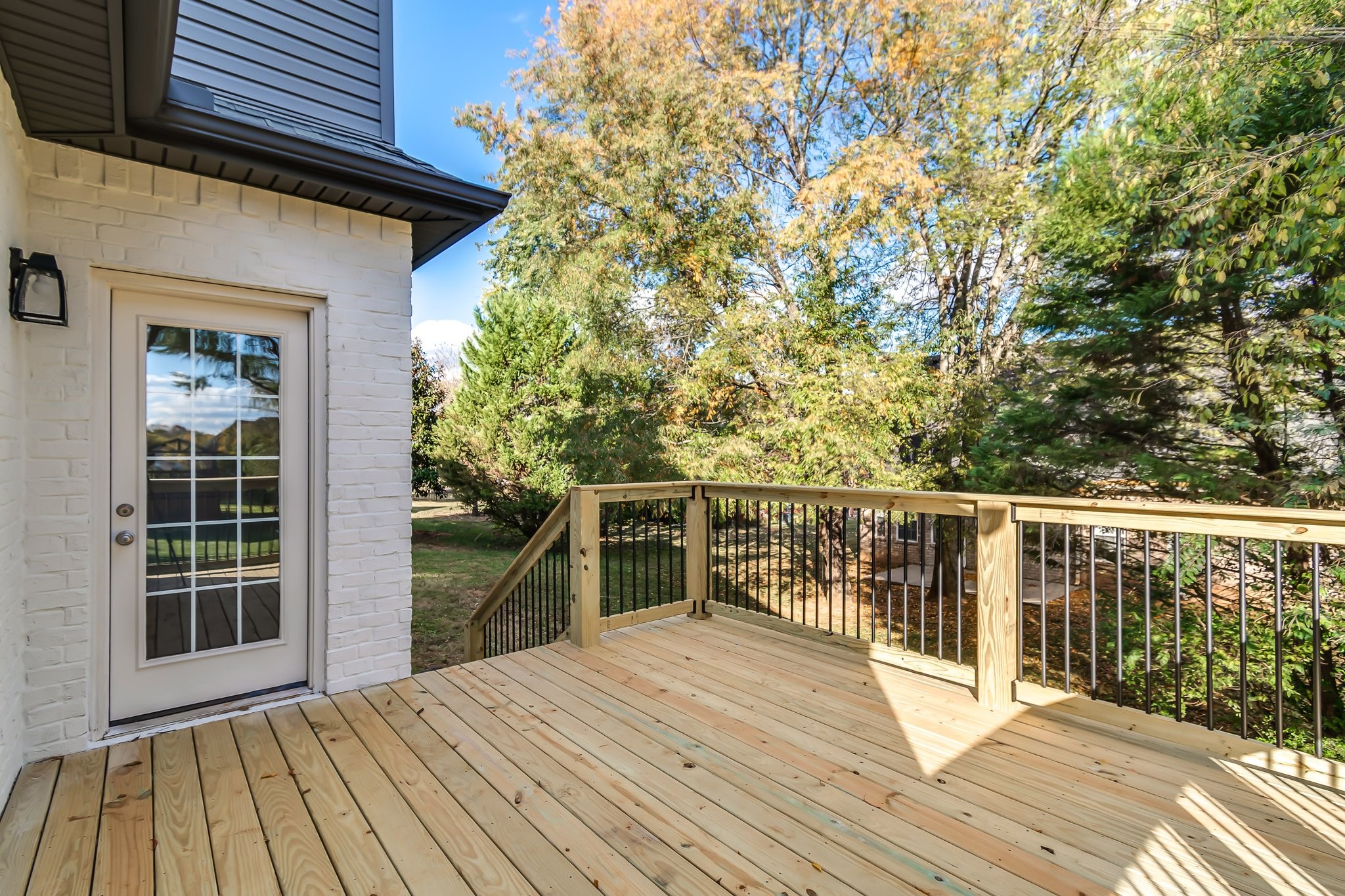 5126 Reagan Drive Murfreesboro, TN 37129 - Photo 19 of 20 a view of balcony with wooden floor and fence