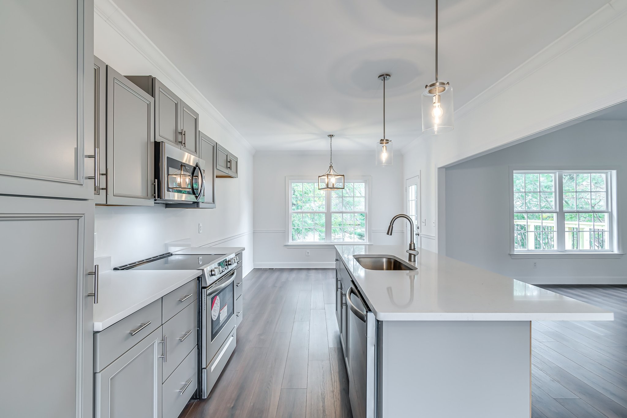5126 Reagan Drive Murfreesboro, TN 37129 - Photo 6 of 20 a kitchen with stainless steel appliances granite countertop a sink stove and refrigerator