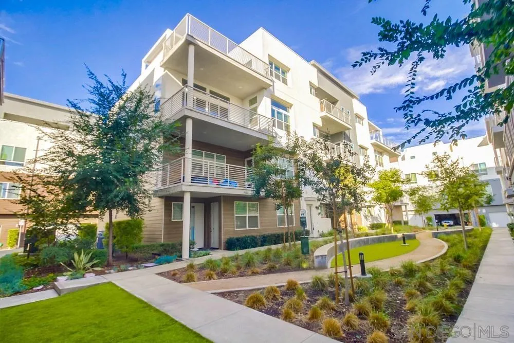2035 Bravo Loop, Unit 6 Chula Vista, CA 91915 - Photo 1 of 39 a view of a house with a swimming pool