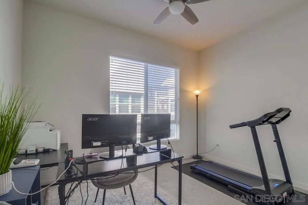 2035 Bravo Loop, Unit 6 Chula Vista, CA 91915 - Photo 23 of 39 a view of a livingroom with furniture and a flat screen tv