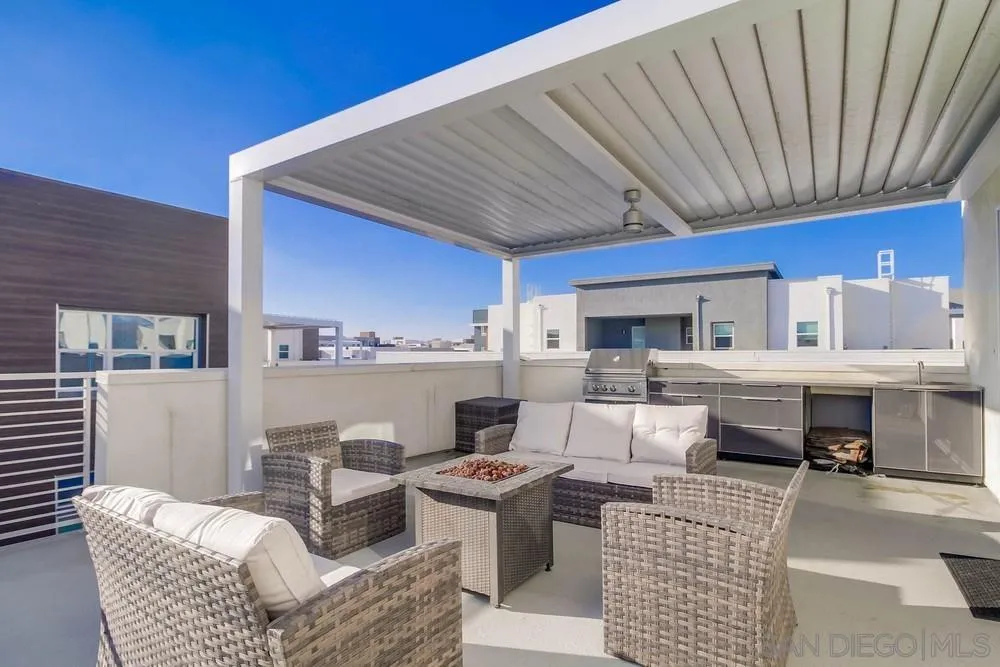 2035 Bravo Loop, Unit 6 Chula Vista, CA 91915 - Photo 36 of 39 a living room with furniture and a fireplace