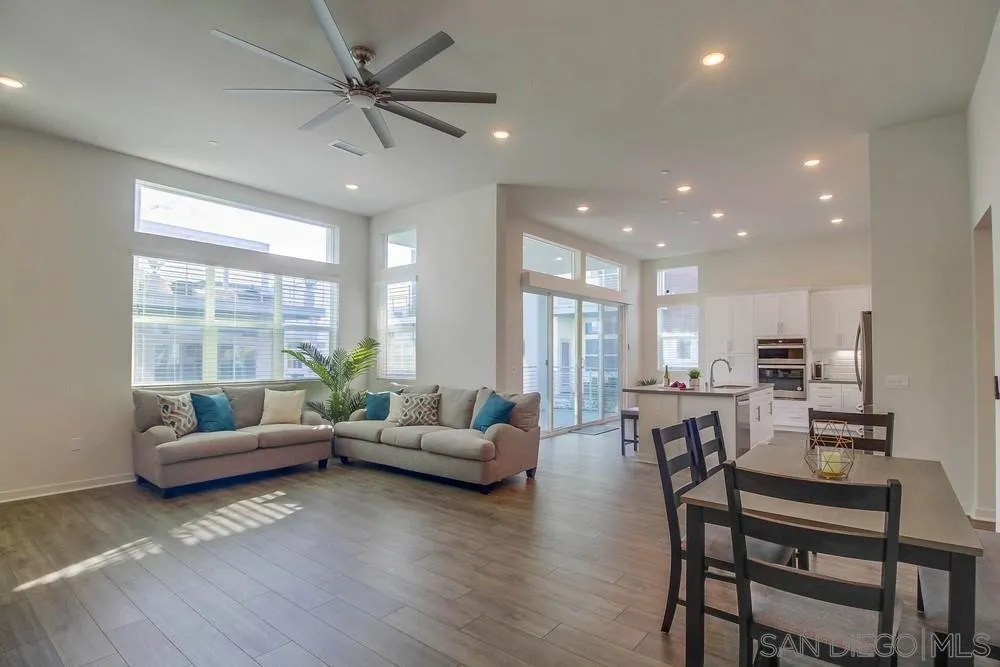 2035 Bravo Loop, Unit 6 Chula Vista, CA 91915 - Photo 7 of 39 a living room with furniture and a large window