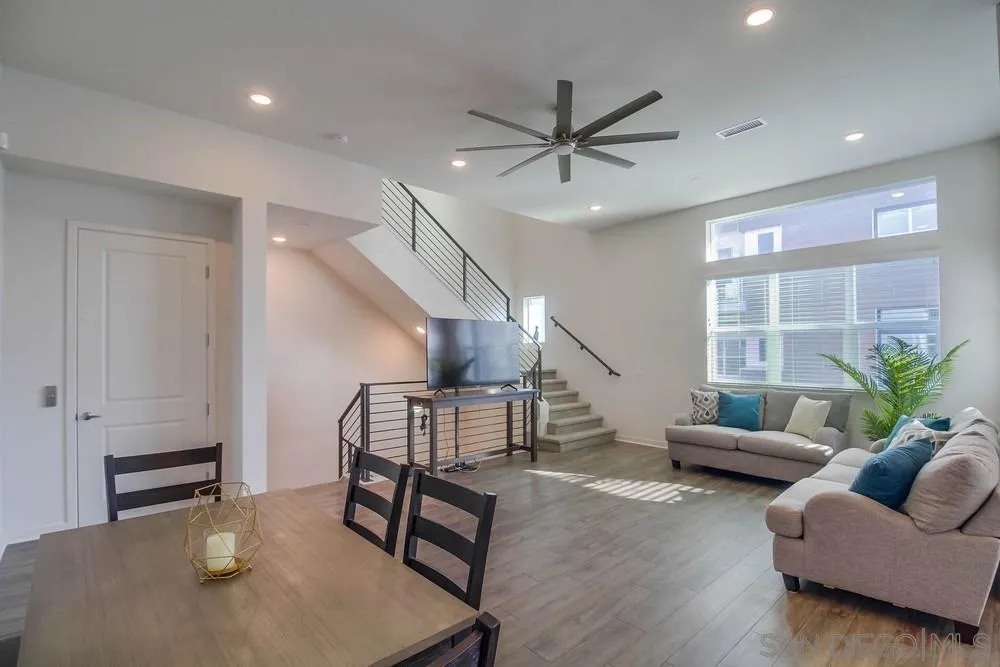 2035 Bravo Loop, Unit 6 Chula Vista, CA 91915 - Photo 8 of 39 a living room with furniture and wooden floor