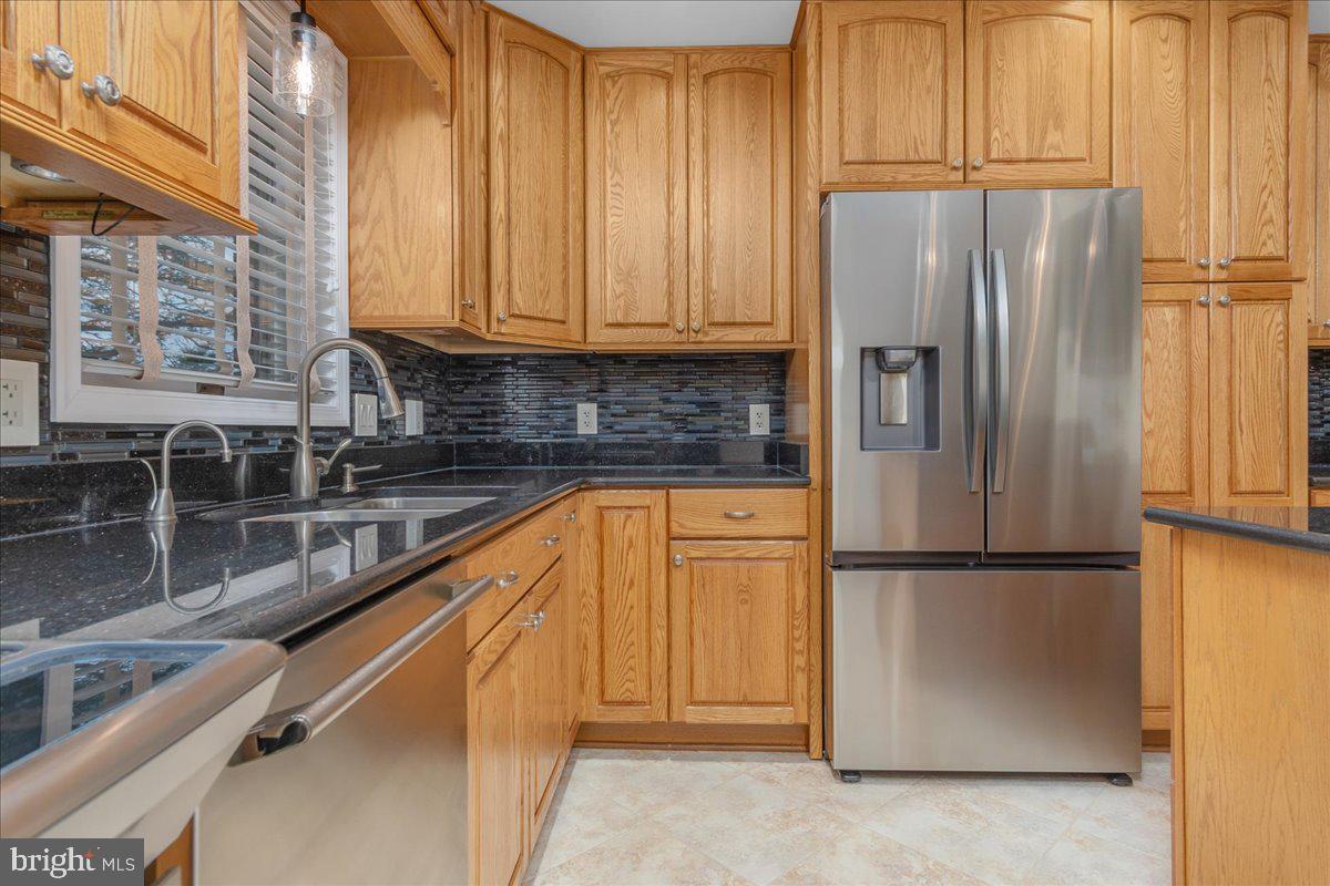 11 Funkstown Road Hagerstown, MD 21740 - Photo 12 of 39 a kitchen with stainless steel appliances granite countertop a refrigerator and a sink