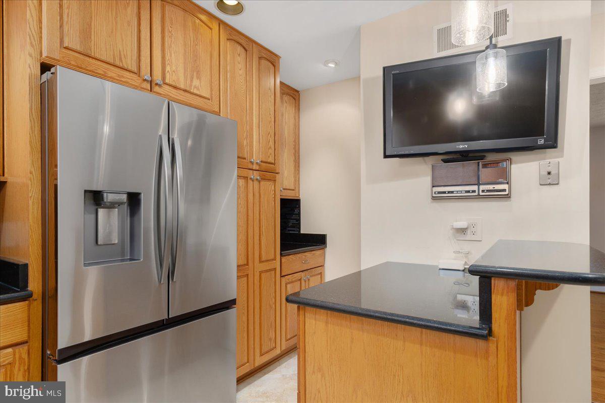 11 Funkstown Road Hagerstown, MD 21740 - Photo 15 of 39 a kitchen with stainless steel appliances a refrigerator a sink and a stove