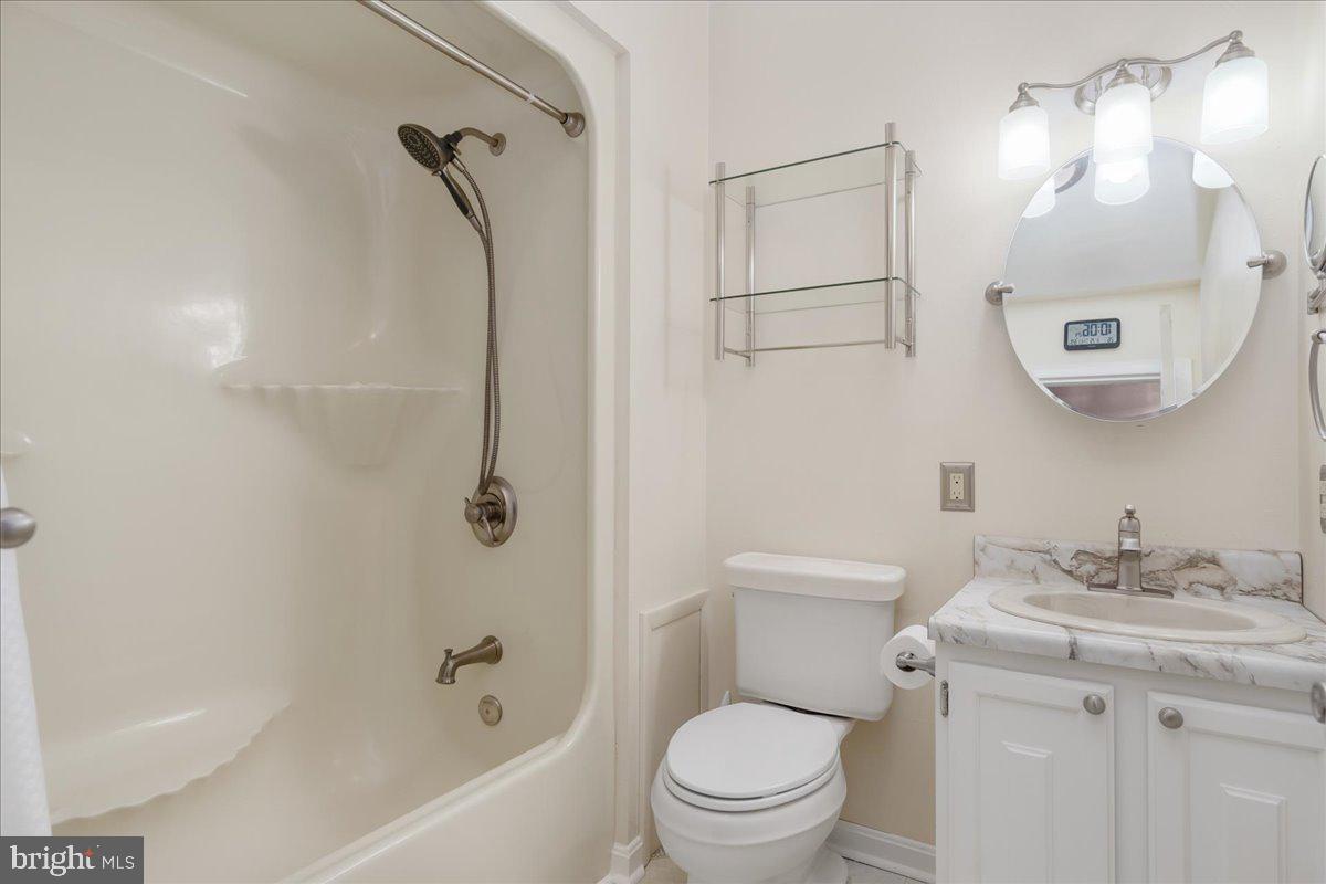 11 Funkstown Road Hagerstown, MD 21740 - Photo 21 of 39 a bathroom with a granite countertop sink toilet and shower