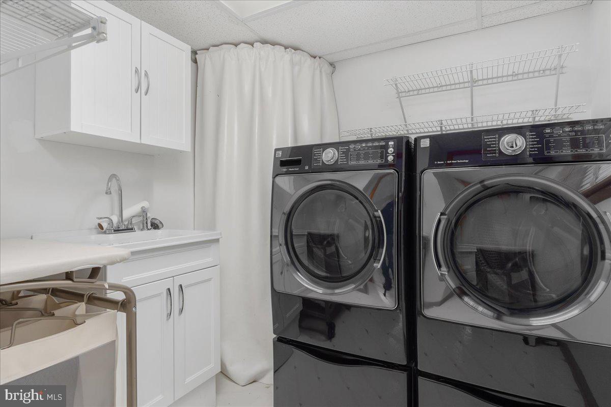 11 Funkstown Road Hagerstown, MD 21740 - Photo 27 of 39 a utility room with sink dryer and washer