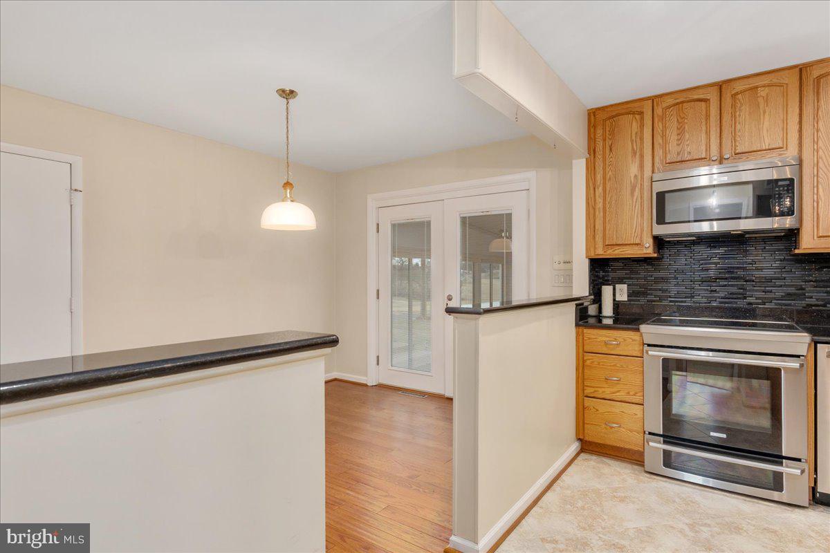 11 Funkstown Road Hagerstown, MD 21740 - Photo 8 of 39 a kitchen with a refrigerator and a stove top oven
