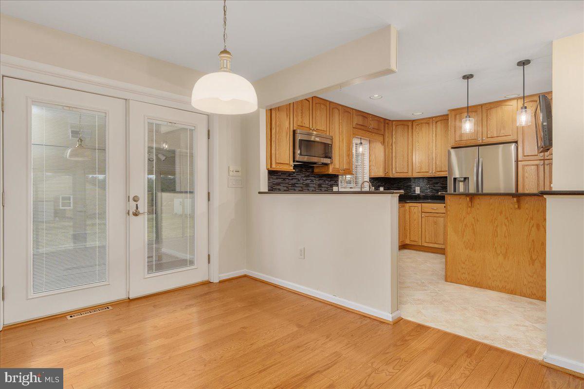 11 Funkstown Road Hagerstown, MD 21740 - Photo 9 of 39 a view of a kitchen with cabinets and wooden floor