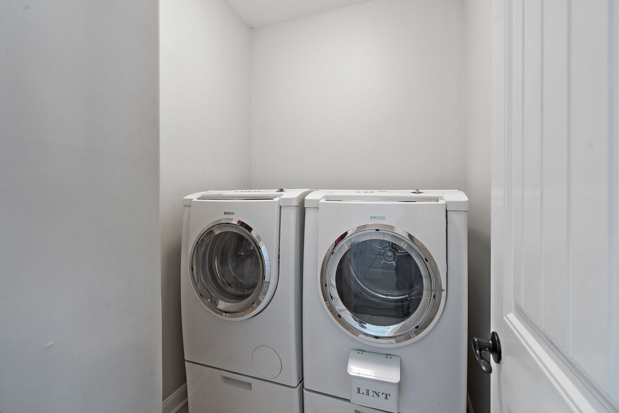 2521 Pennington Bend Road, Unit 214 Nashville, TN 37214 - Photo 12 of 25 a utility room with dryer and washer