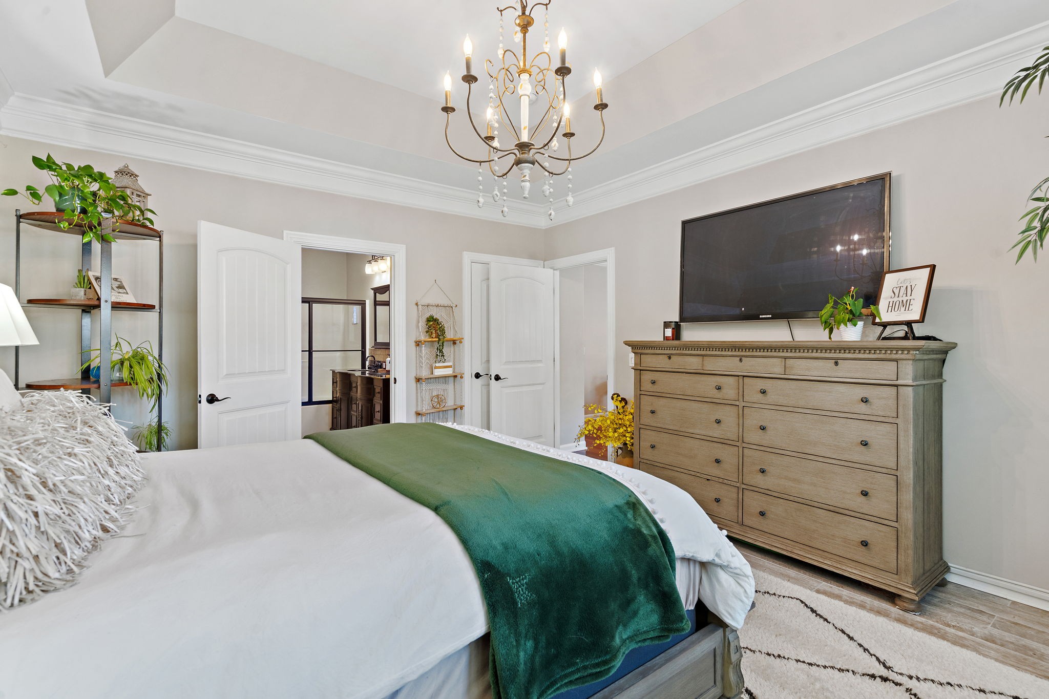 2521 Pennington Bend Road, Unit 214 Nashville, TN 37214 - Photo 14 of 25 a bedroom with a bed and a flat screen tv