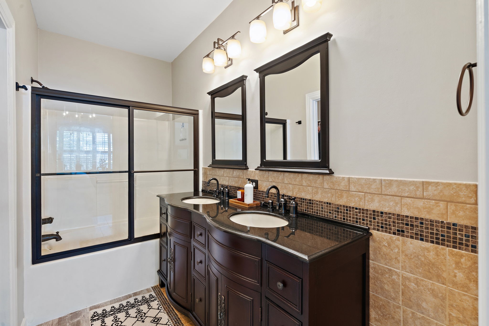 2521 Pennington Bend Road, Unit 214 Nashville, TN 37214 - Photo 15 of 25 a bathroom with a sink vanity and a mirror