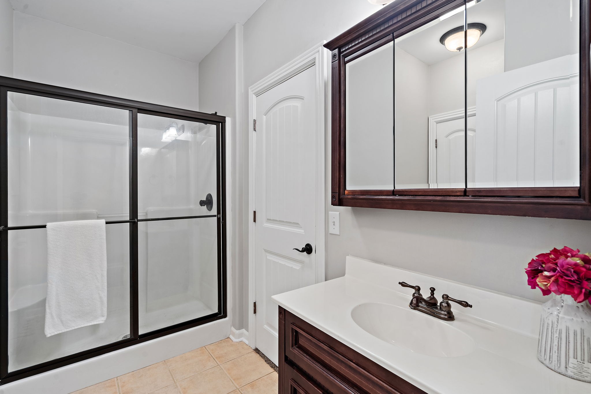 2521 Pennington Bend Road, Unit 214 Nashville, TN 37214 - Photo 19 of 25 a bathroom with a sink and a mirror