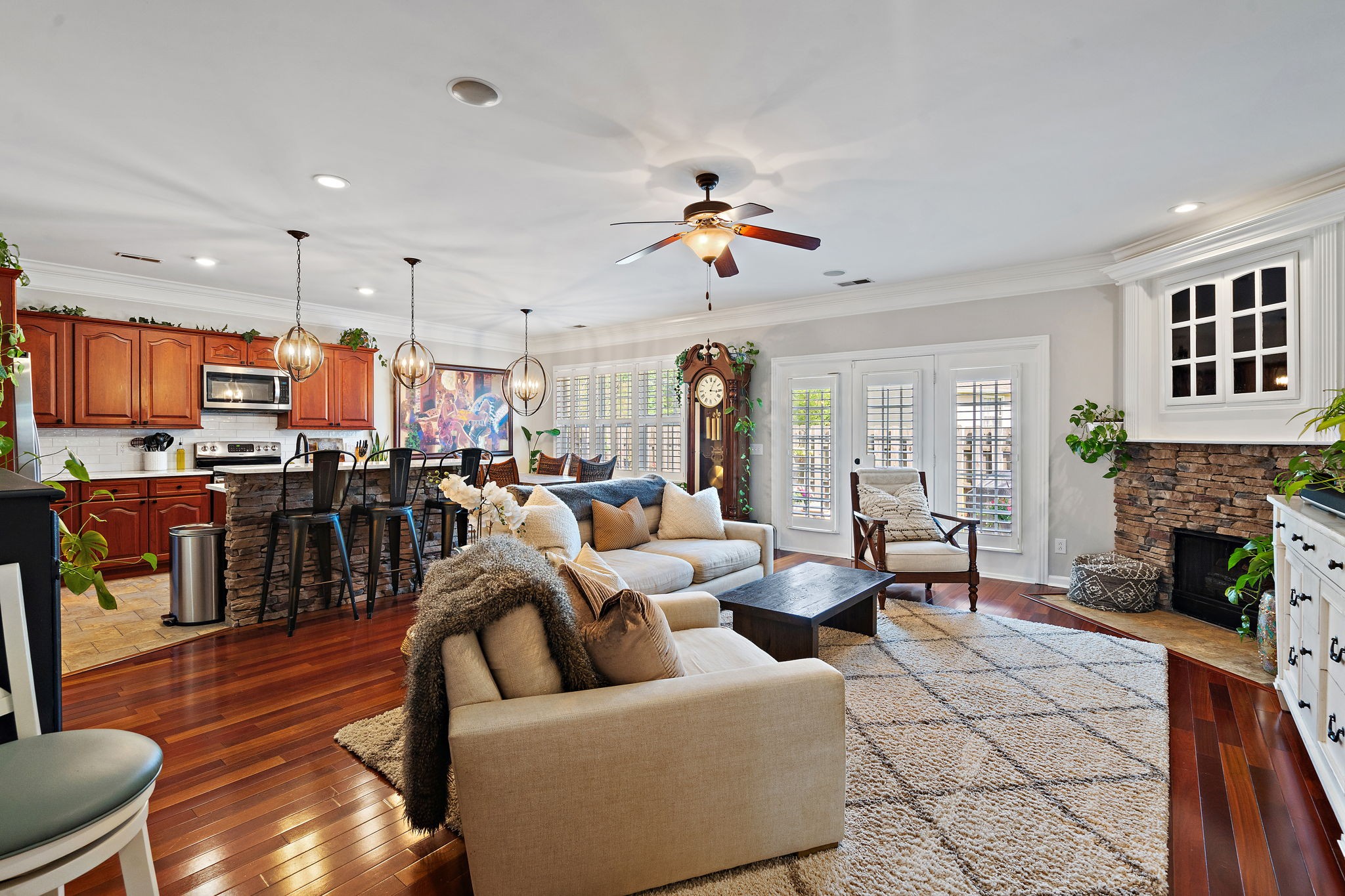 2521 Pennington Bend Road, Unit 214 Nashville, TN 37214 - Photo 5 of 25 a living room with fireplace furniture and a kitchen view