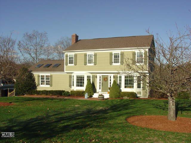 6 Hawley Lane Monroe, CT 06468 - Photo 1 of 1 a front view of a house with a yard