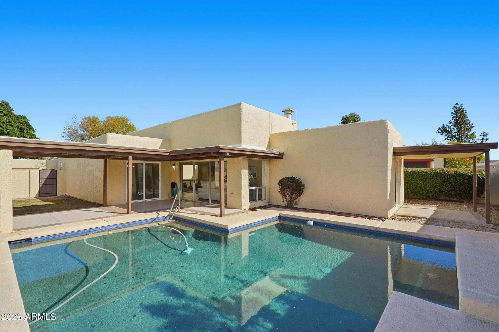 3011 West Sierra Street Phoenix, AZ 85029 - Photo 33 of 35 a front view of a house with a yard
