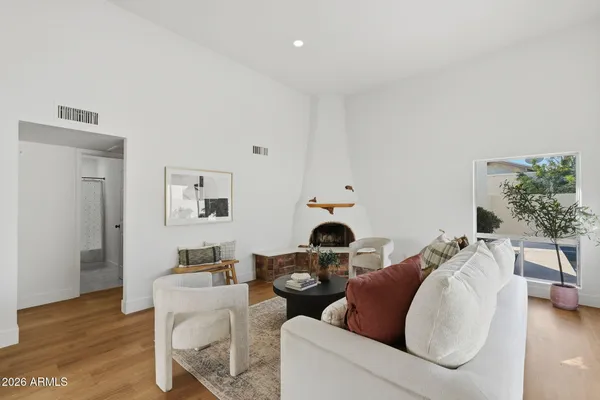 a living room with furniture and a table