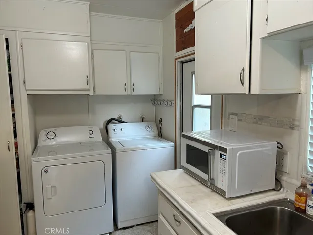 a bathroom with a shower and a mirror