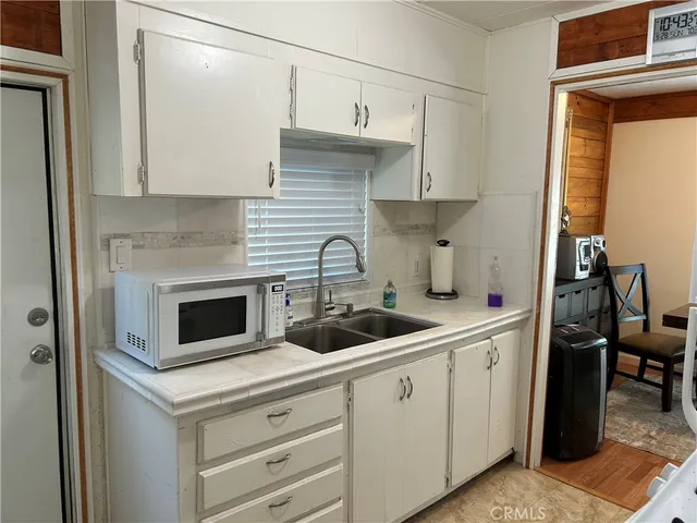 a bathroom with a sink and a shower