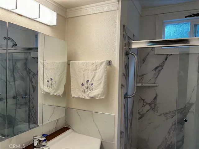 a view of a livingroom with furniture and windows