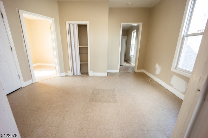 99 North 3rd Street Paterson, NJ 07522 - Photo 16 of 18 an empty room with windows