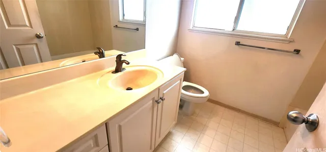 a bathroom with a sink and a toilet