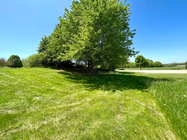 a view of a golf course with a lake