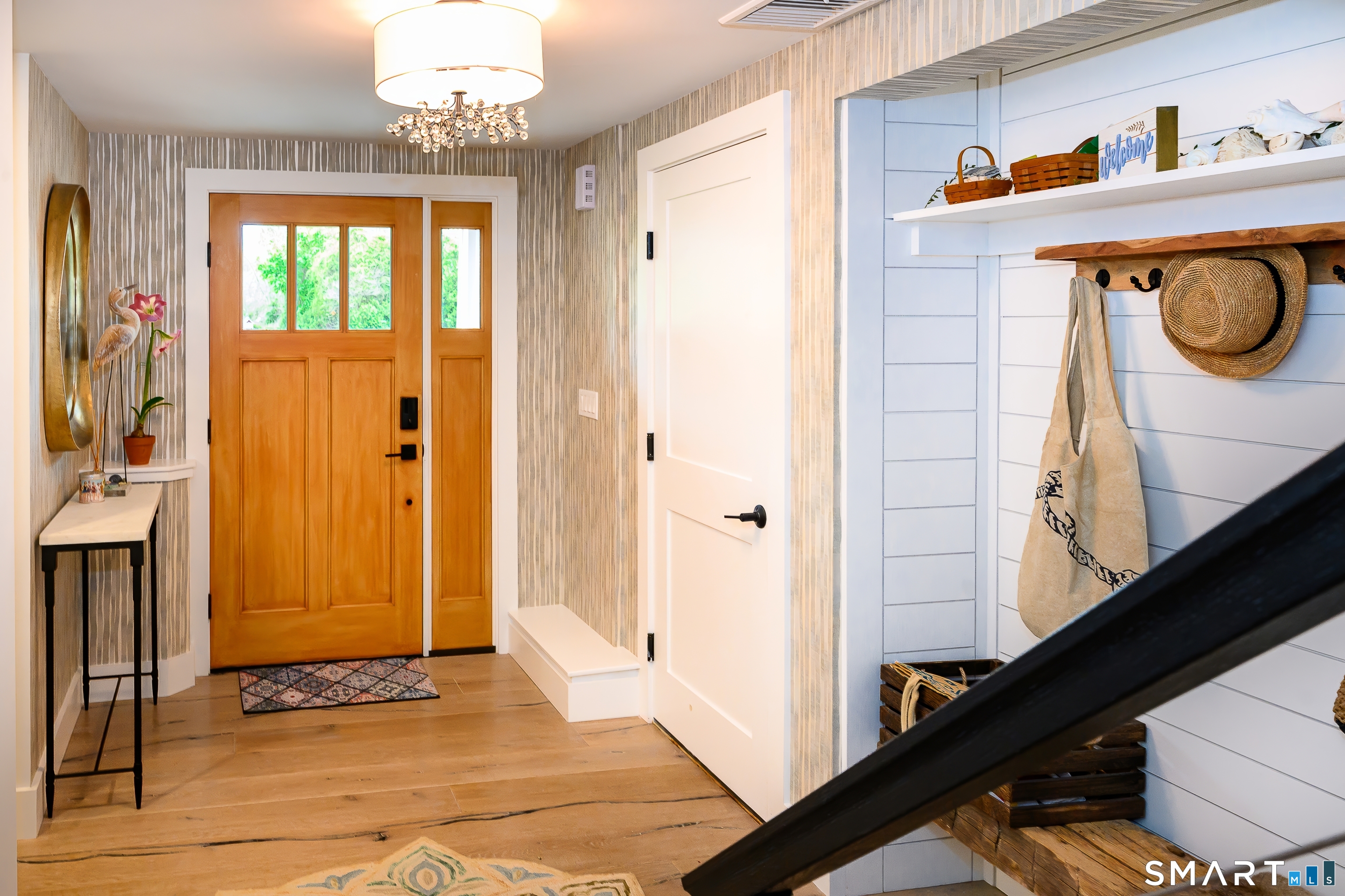 8 East Wharf Road Waterford, CT 06385 - Photo 21 of 40 a view of a entryway door with wooden floor
