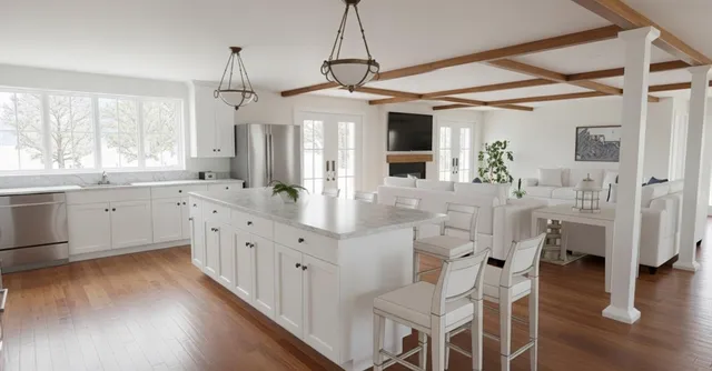 a kitchen with stainless steel appliances kitchen island granite countertop a stove a sink and white cabinets with wooden floor