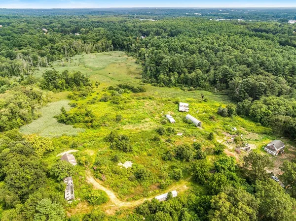 a view of a yard with an outdoor space