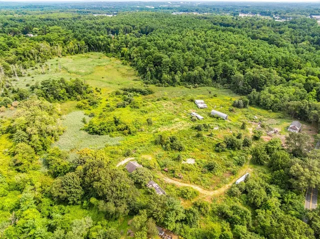 a view of a yard with an outdoor space