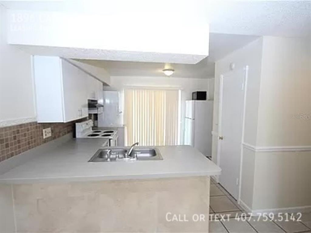 1896 Caralee Boulevard, Unit 2 Orlando, FL 32822 - Photo 3 of 8