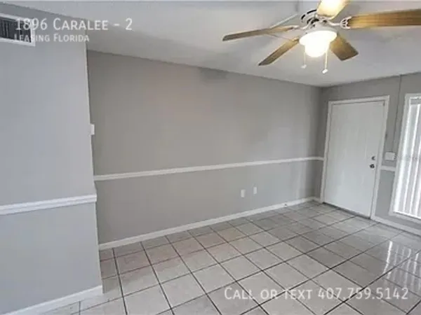 a view of an empty room and window