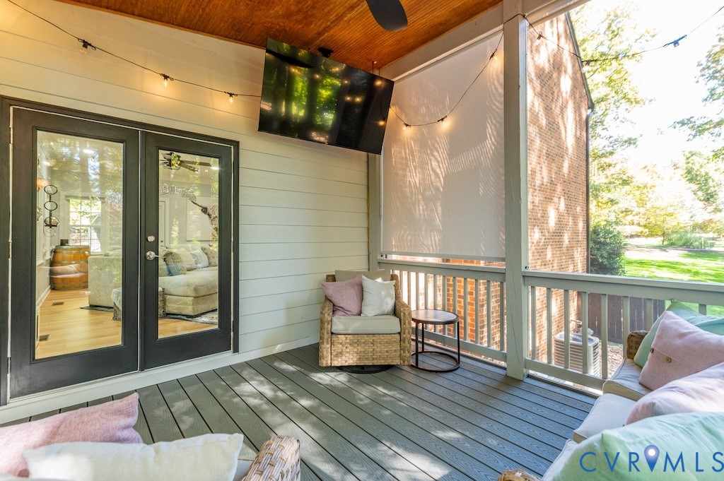 11802 Glendevon Road Chesterfield, VA 23838 - Photo 31 of 47 a view of balcony with floor to ceiling window with wooden floor