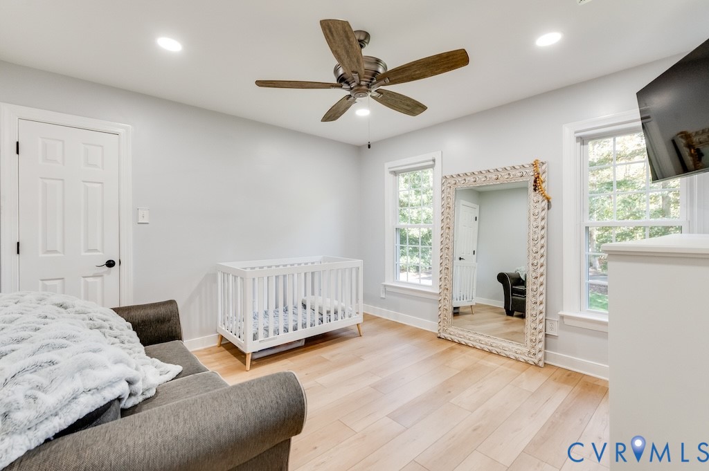 11802 Glendevon Road Chesterfield, VA 23838 - Photo 38 of 47 a bedroom with a bed and a window