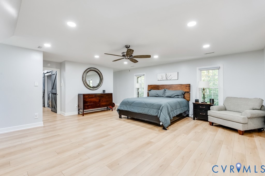 11802 Glendevon Road Chesterfield, VA 23838 - Photo 39 of 47 a bedroom with a bed and ceiling fan