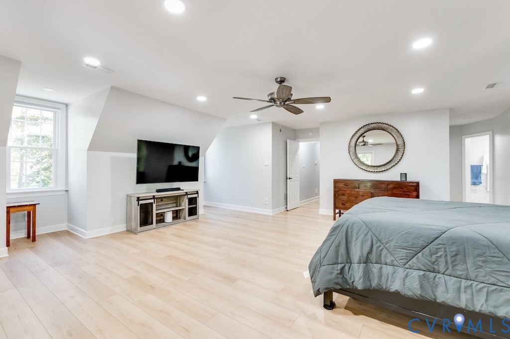 11802 Glendevon Road Chesterfield, VA 23838 - Photo 40 of 47 a living room with furniture a flat screen tv and a large window