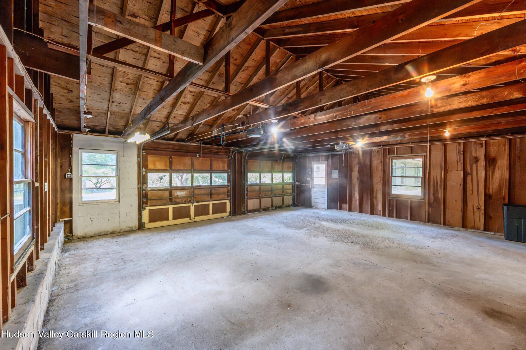 4533 Atwood Road Stone Ridge, NY 12484 - Photo 52 of 63 a view of an empty room with a garage