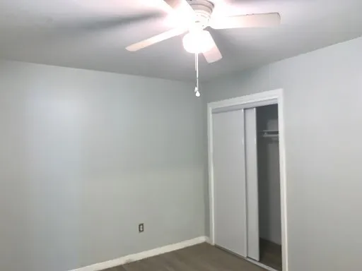 a view of a chandelier fan in a room