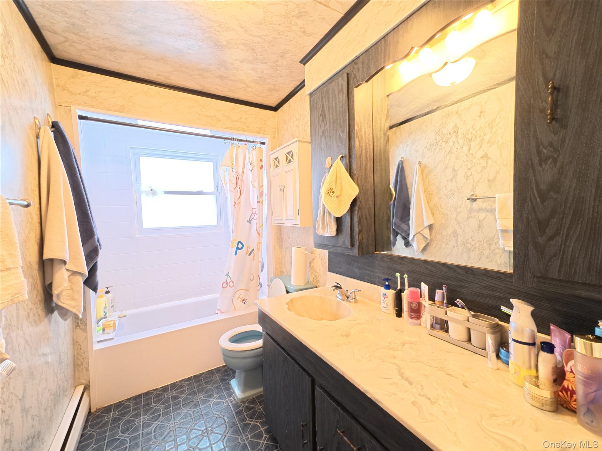 10 Kings Park Road Commack, NY 11725 - Photo 19 of 29 a bathroom with a granite countertop sink toilet and shower