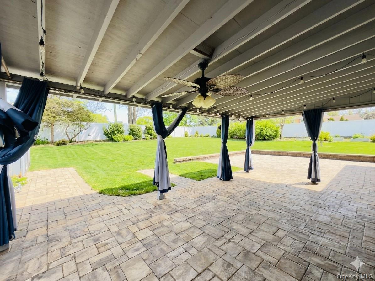 10 Kings Park Road Commack, NY 11725 - Photo 28 of 29 a view of a room with porch and a patio